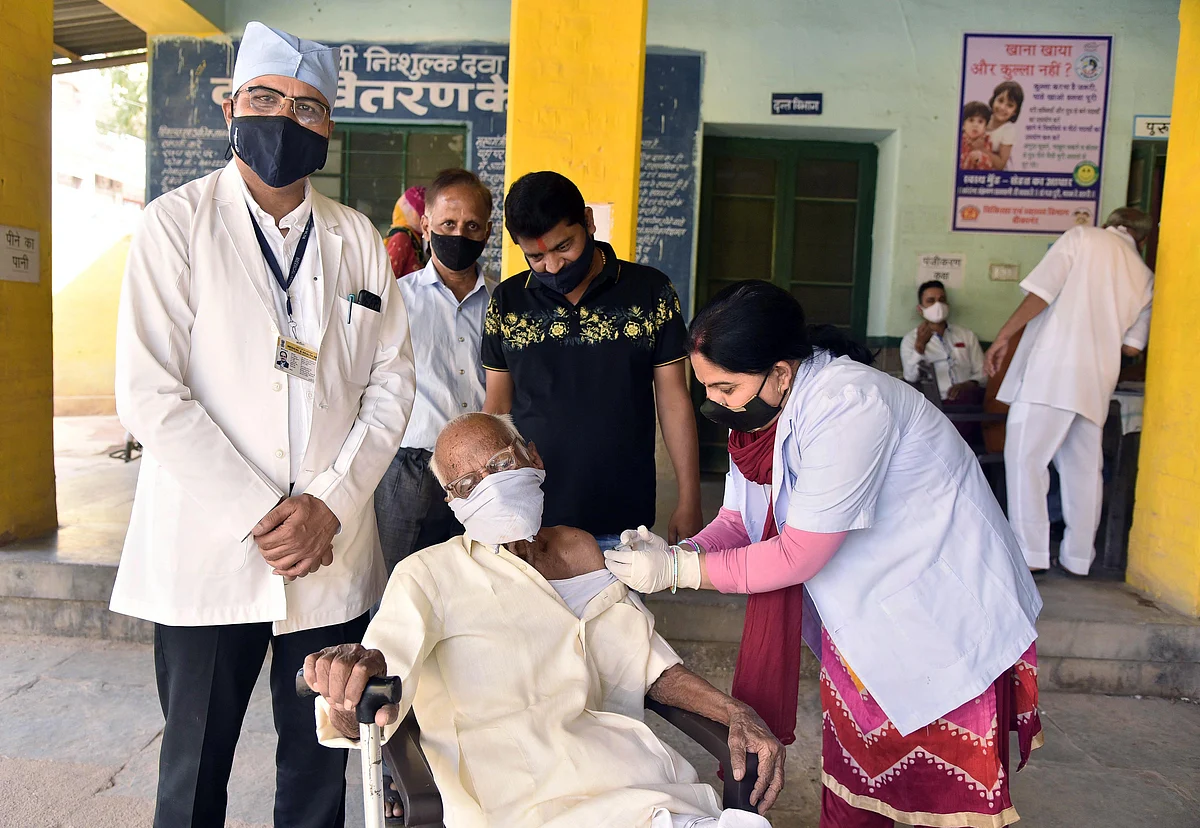 A senior citizen in rural India being administered a vaccine. The scale of India’s internal programme is astounding given all the challenges the authorities have to surmount.