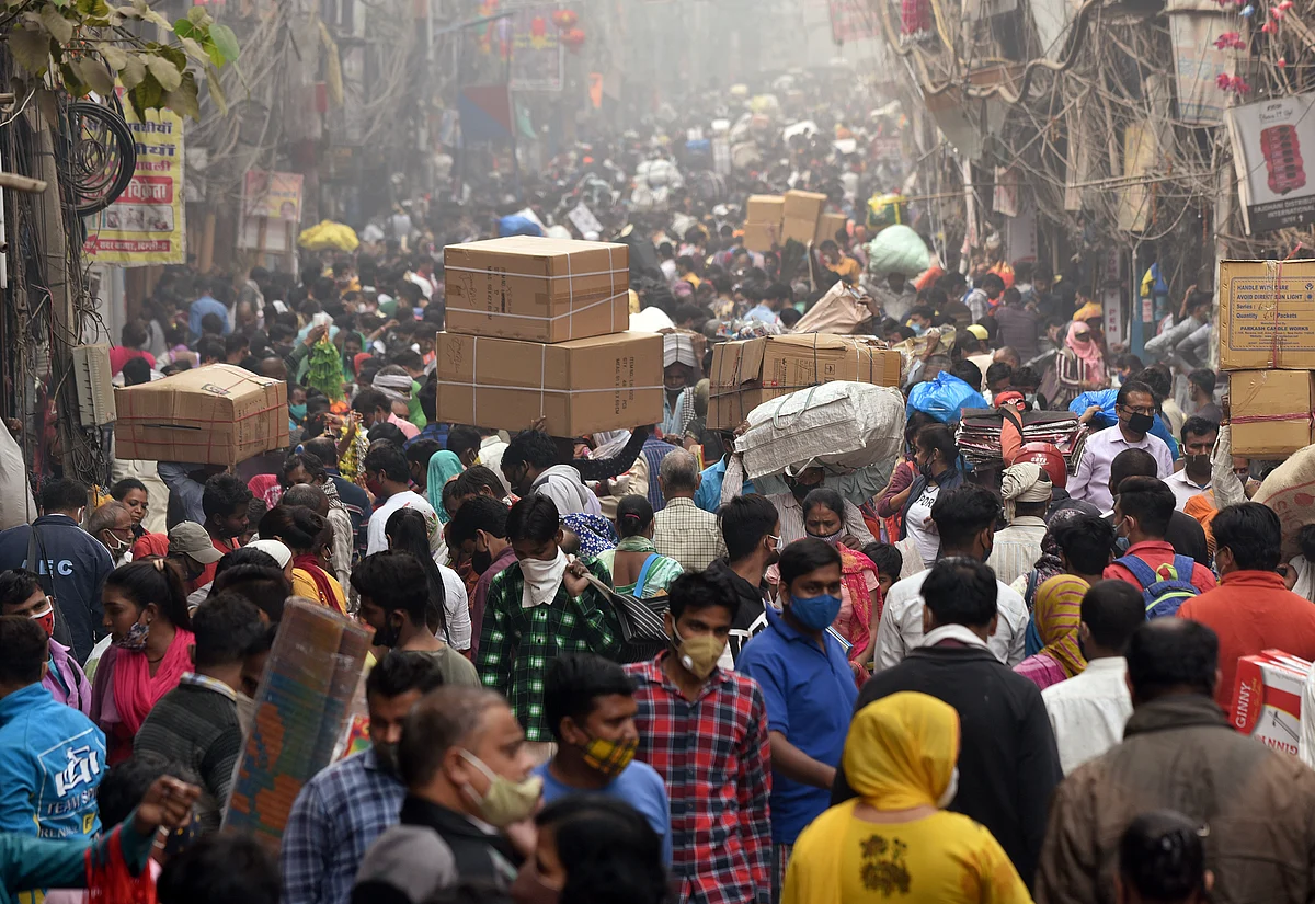 Shoppers throng a market-place. Many experts welcome the deepening and broadening of India’s equity culture, they also caution investors to take lessons from previous boom-bust cycles.