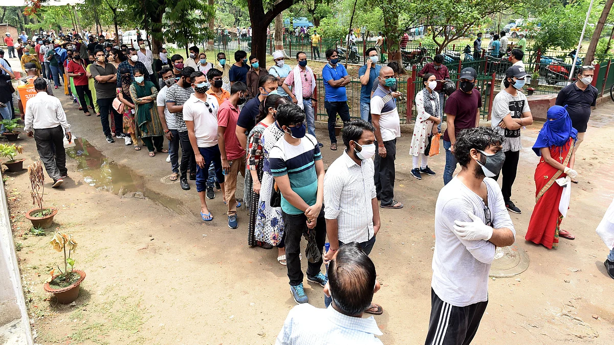 People in India queue up to receive a dose of the Covid-19 vaccine as the country battles a deadlier variant of the virus. The call for a vaccine patent waiver was always going to be a complex discussion among the WHO member nations.