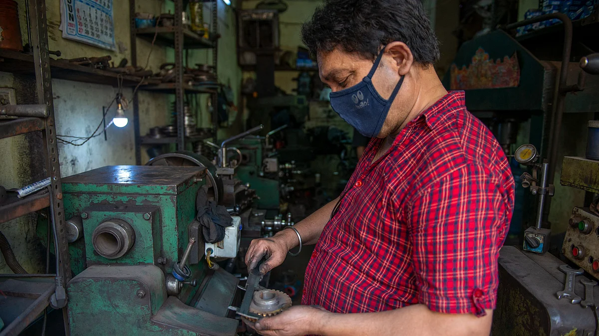 A skilled worker working on a lathe machine in his workshop at Anand Parbat Industrial Area during the unlocking process, as construction activities and factories resume in the ongoing Covid-19 lockdown by order of Delhi Government. The growth versus price control debate in India has begun in earnest as all eyes are on the economy.