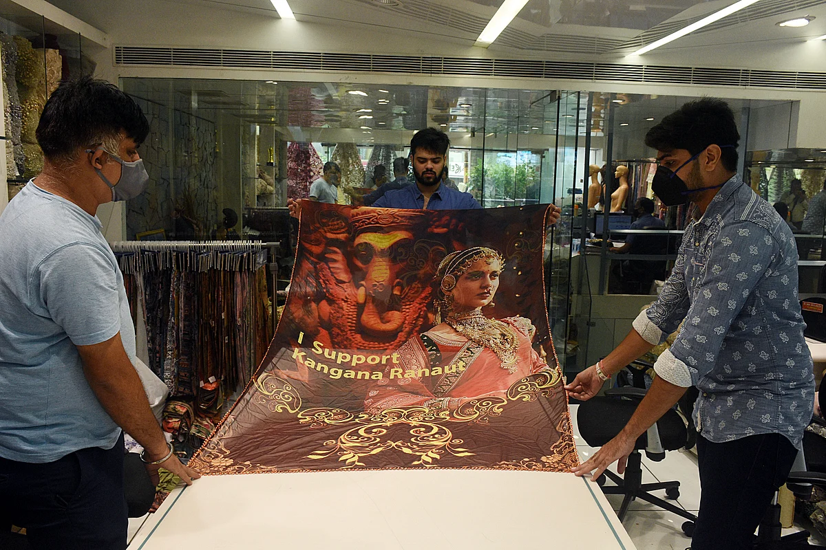 Textiles merchants manufacturing sarees with printed "I support Kangana Ranaut" at textiles market, in Surat. Despite rising exports of cotton yarn, fabrics and made-ups from India growing by as much as 69 percent this year, the EU and US have remained a challenge for Indian exporters.