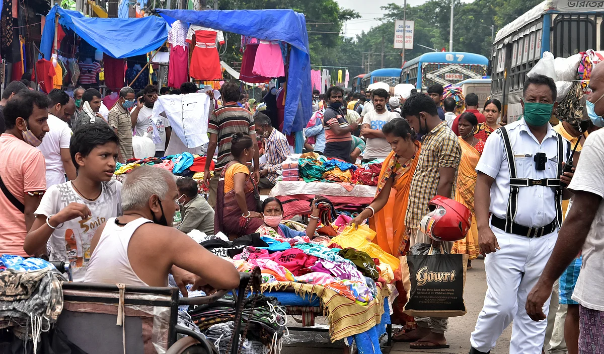 People thronging a garments market during the pandemic and flouting social distancing rules. The second pandemic wave forced the pharma industry to ensure the availability of life saving medicines by boosting production.