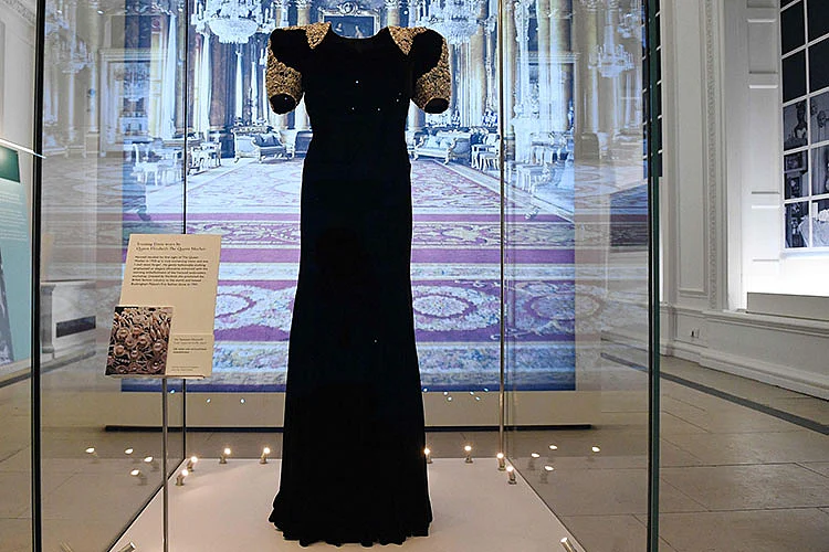 An evening dress worn by Queen Elizabeth, Queen Mother designed by Norman Hartnell.