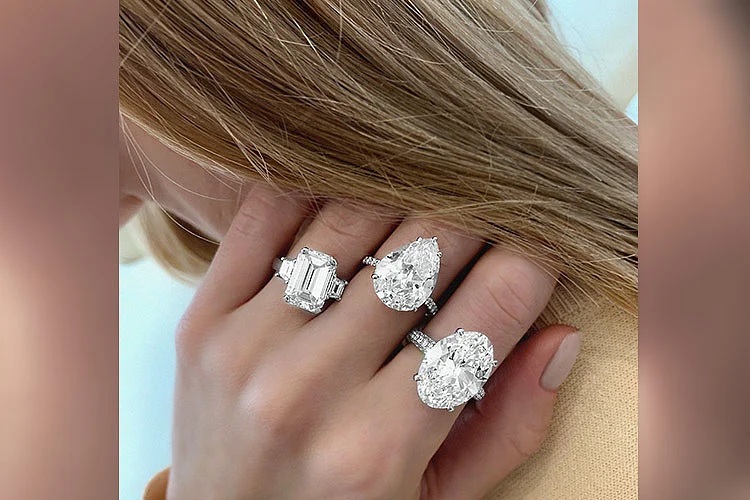 Emerald-cut diamond ring weighing 10.79 carats, pear-shaped diamond ring weighing 8.16 carats and oval-shaped diamond ring weighing 20.83 carats from YATAGHAN.