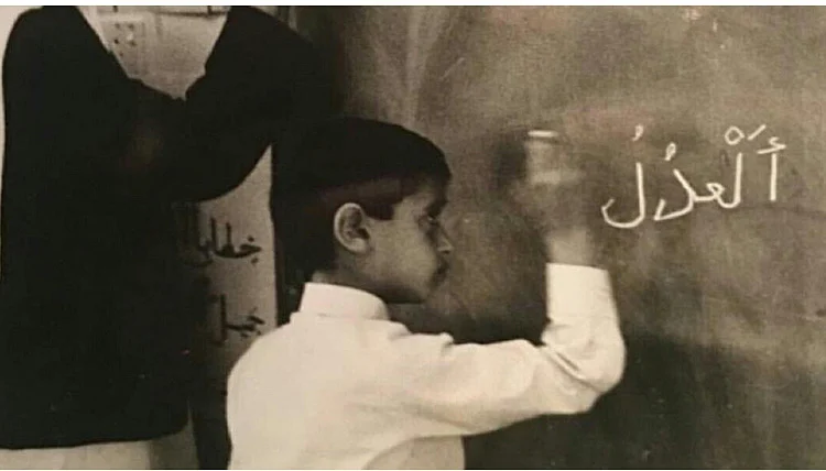 Sheikh Mohamed Bin Zayed attends a lesson at school.