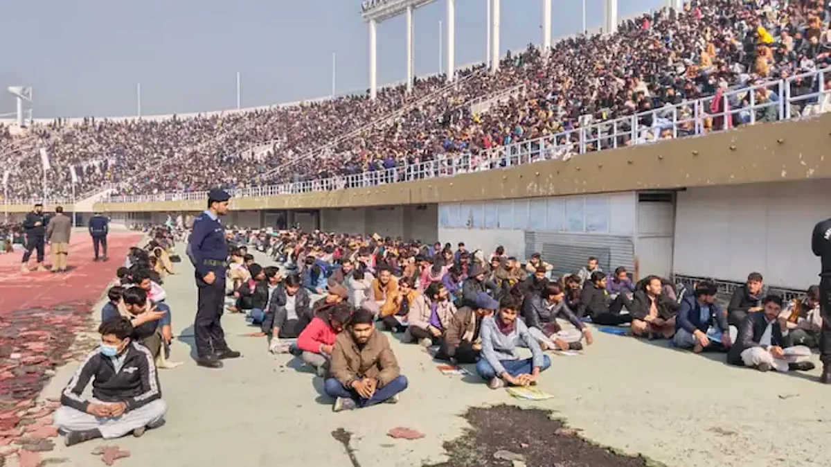 Over 30,000 appear for police constable exam in Pakistan, sit on stadium ground to write paper