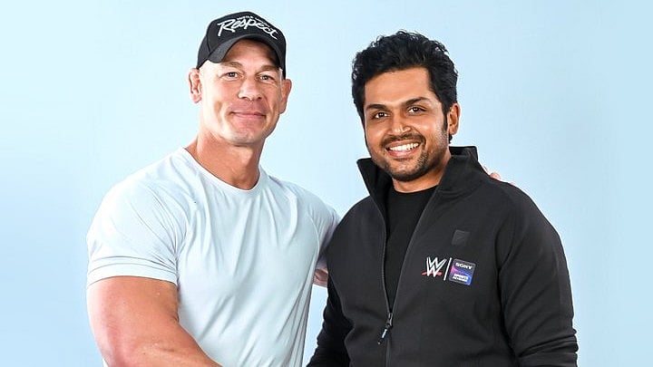 இந்தியாவில் முதல் முறையாக WWE:வீரர் ஜான் சீனாவுடன் நடிகர் கார்த்தி சந்திப்பு!