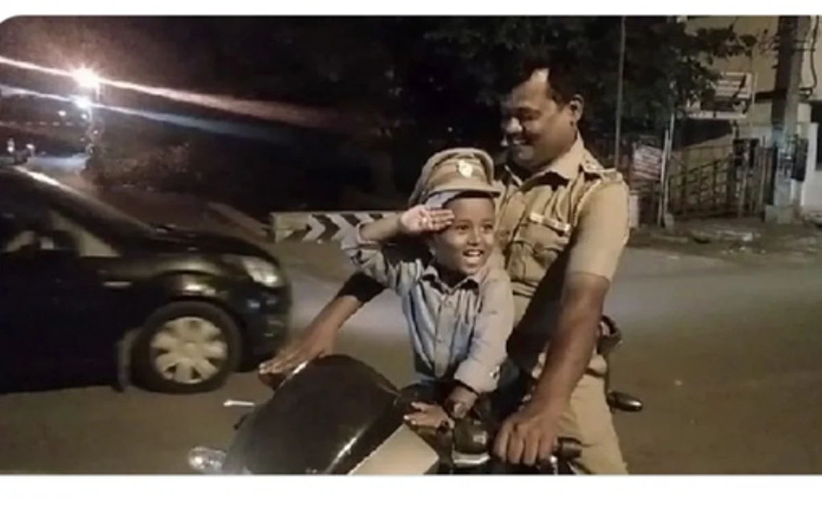 'ஸார், உங்க தொப்பியை மாட்டிக்கிட்டு பைக்ல போகணும்! ': 4 வயது சிறுவனை நெகிழ வைத்த எஸ்ஐ