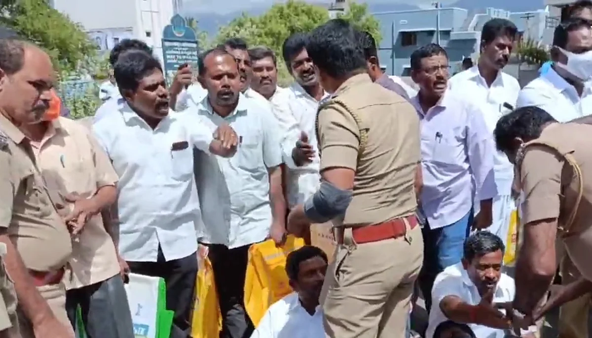 ஒப்பந்ததாரர்களுக்கும், காவல்துறையினருக்கும் இடையே நடந்த வாக்குவாதம்.