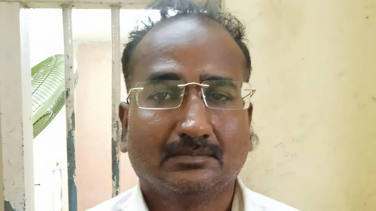 கைது செய்யப்பட்ட வேலு.
