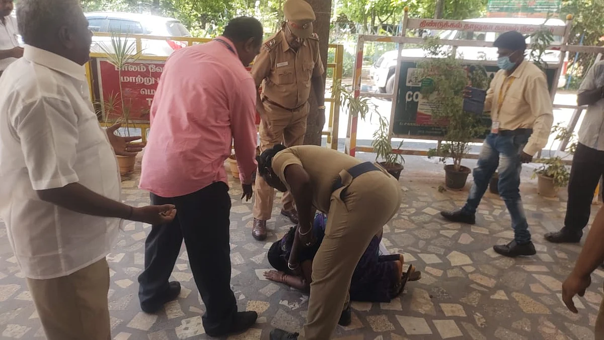 'அதிமுக நிர்வாகி கொலை மிரட்டல் விடுகிறார்'; போலீஸார் காலில் விழுந்து கதறிய தம்பதி: கலெக்டர் ஆபீஸில் பரபரப்பு
