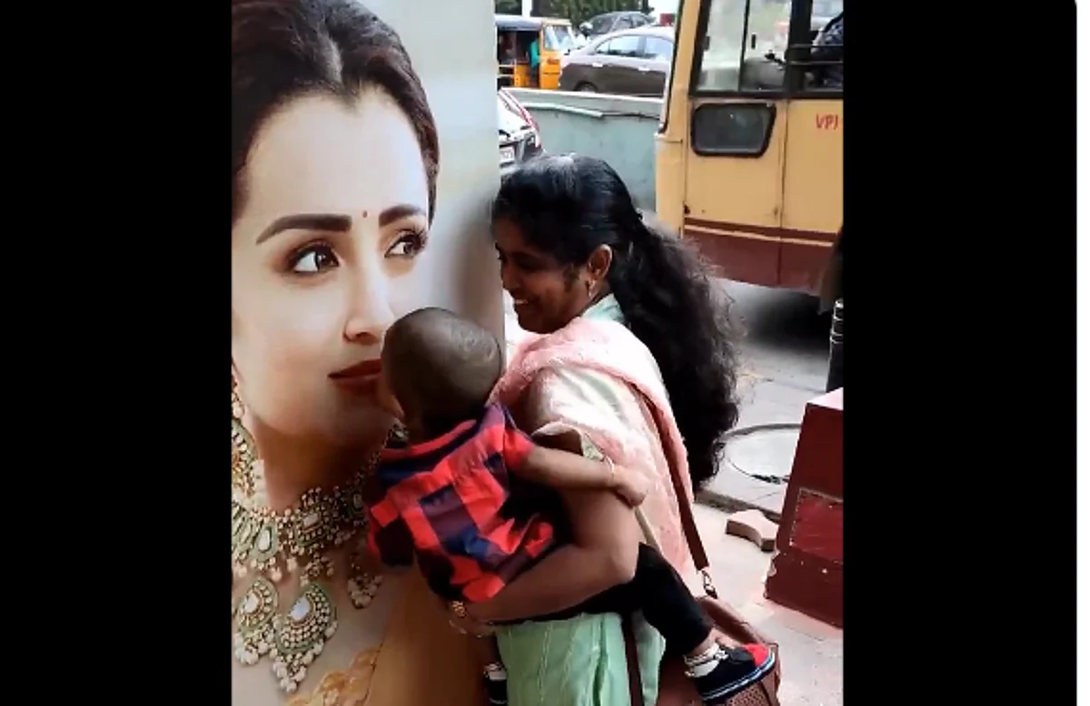 த்ரிஷாவை போஸ்டரில் கொஞ்சும் க்யூட் குழந்தை: வைரல் வீடியோ!