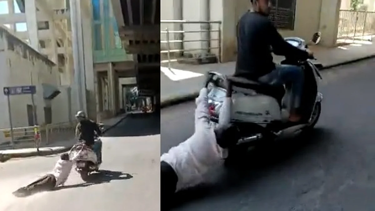 ஸ்கூட்டரில் இழுத்துச்செல்லப்பட்ட முதியவர்; வாலிபரின் குரூரச் செயல்: நெஞ்சை பதறவைக்கும் வீடியோ