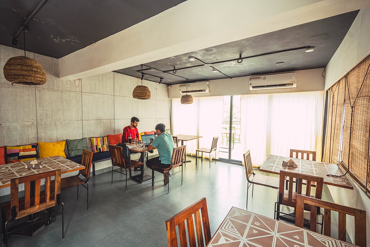 Cafe Charm and Community Love The Greenstraw House on the Riverfront Ahmedabad