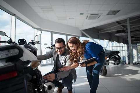 man-buying-fast-motorcycle