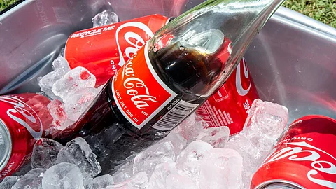 cane sugar in his Coca-Cola