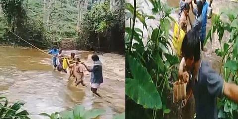 தொடர் மழையால் ஏற்பட்ட காட்டாற்று வெள்ளம்- சிக்கி தவித்த தொழிலாளர்களை மீட்ட கிராம மக்கள்