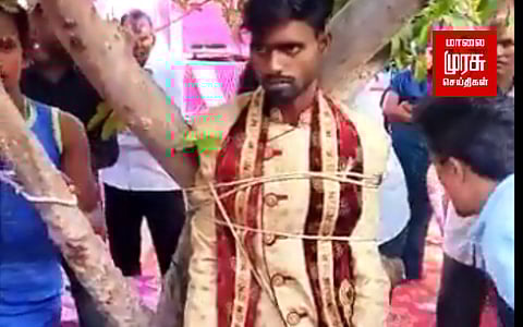 வரதட்சிணையா கேட்கிறாய்?: மணமகனை மரத்தில் கட்டிய பெண் வீட்டார்!