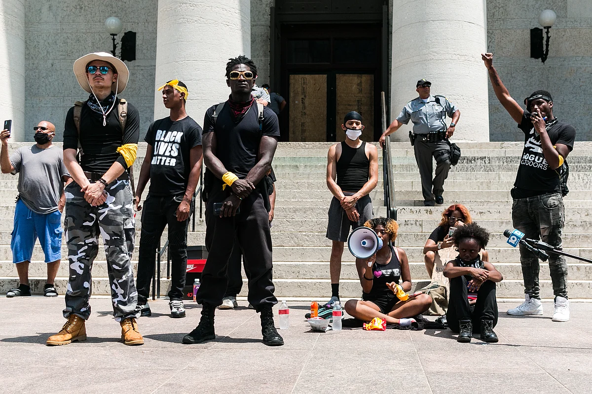 Members of the organization Black Freedom address protesters outside the Ohio Statehouse on June 5, 2020.