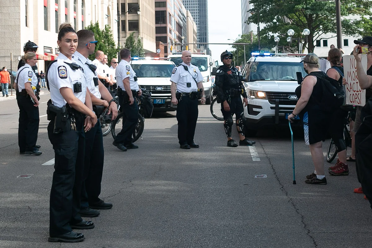 Columbus police officers wore body cameras, indicated by the black square on the right side of each officer's chest, during the Recall Ginther Rally held at Columbus City Hall on June 28, 2020.