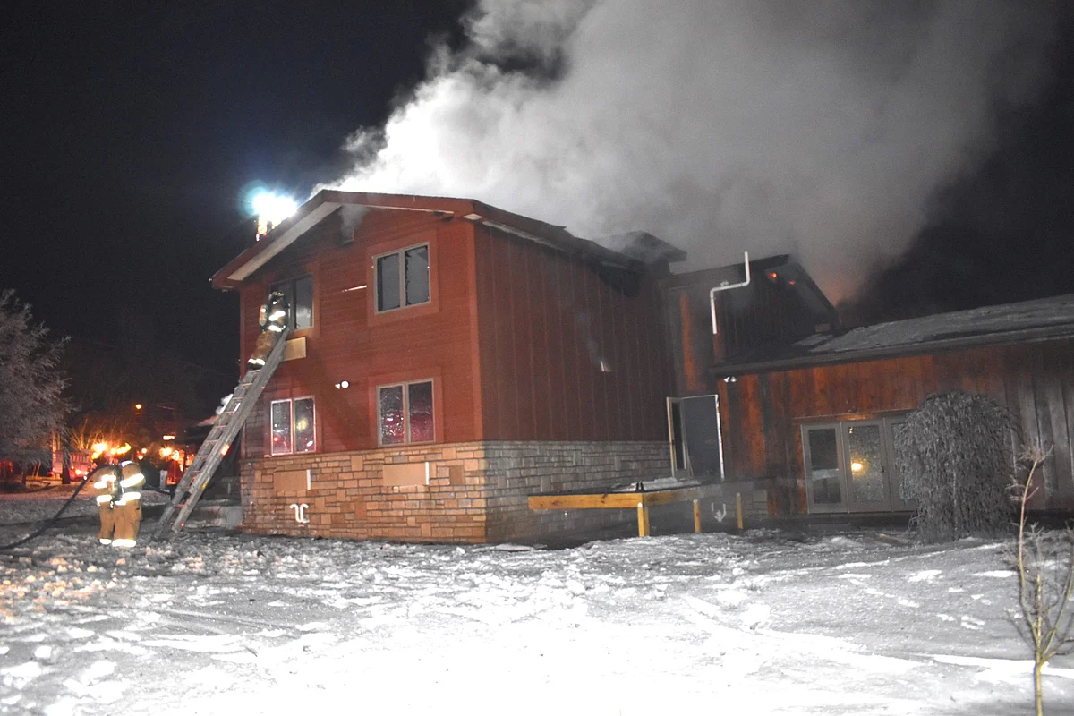 Firefighters fighting the blaze inside 5281 Locust Hill Lane on February 10, 2021.