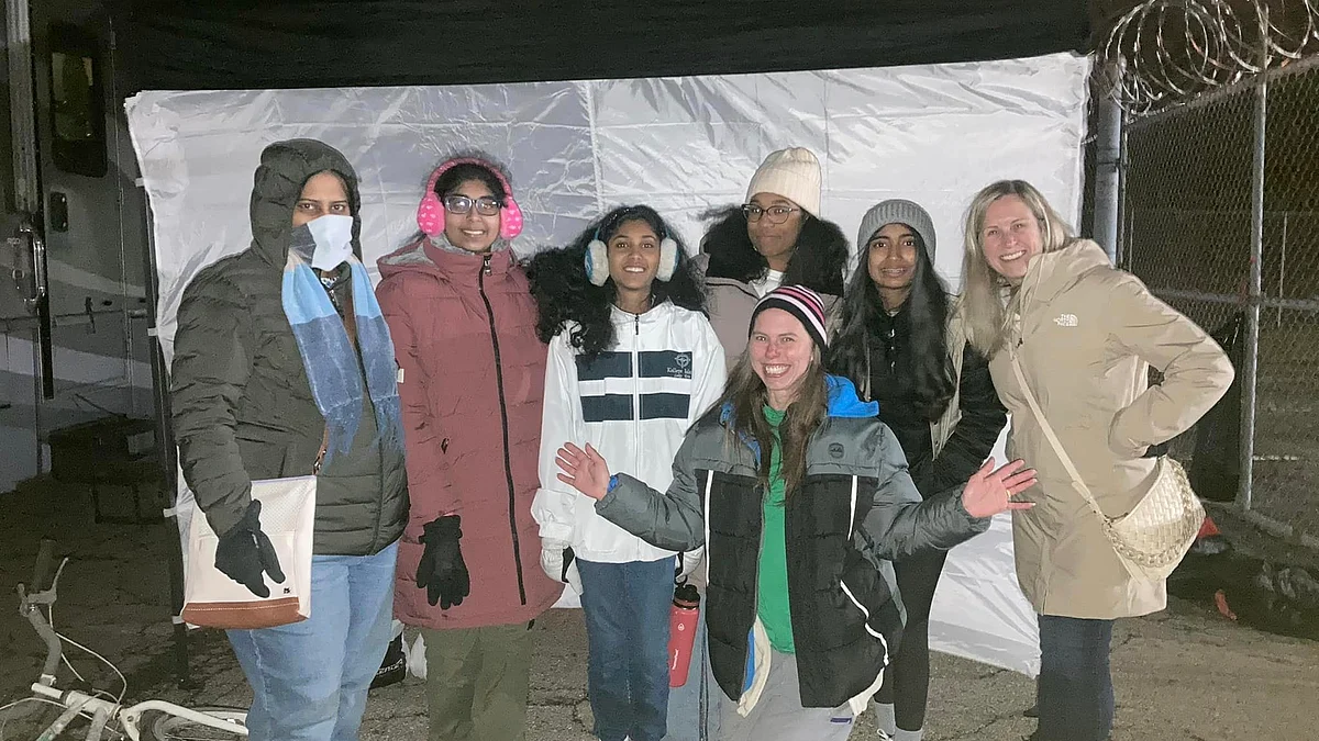Folks from Heer to Serve, with founder Emily Myers in the front, gathered for a photo after working with Girl Scouts in Dublin to hand out handmade items from the organization Warm Up America.