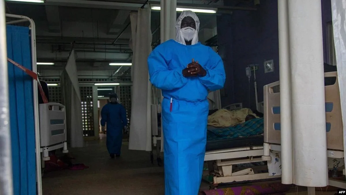 A member of the Ugandan Medical staff of the Ebola Treatment Unit stands inside the ward at Mubende Regional Referral Hospital in Uganda, Sept. 24, 2022 (Image source-VOA)