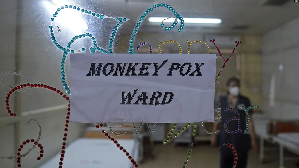 A health worker walks inside an isolation ward built as a precautionary measure for the monkeypox patients at a civil hospital in Ahmedabad, India, July 25, 2022(VOA)