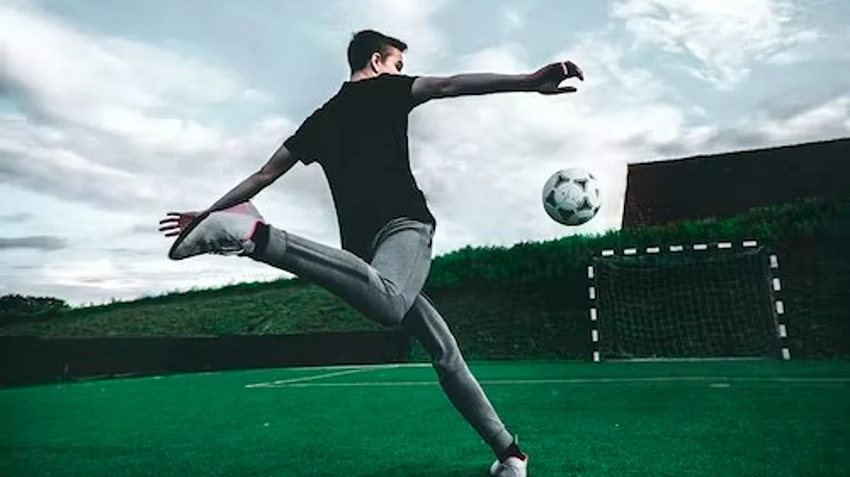 Football is an impact sport that, if played frequently, can amount to hours of exercise, compared to swimming or cycling. (Unsplash)