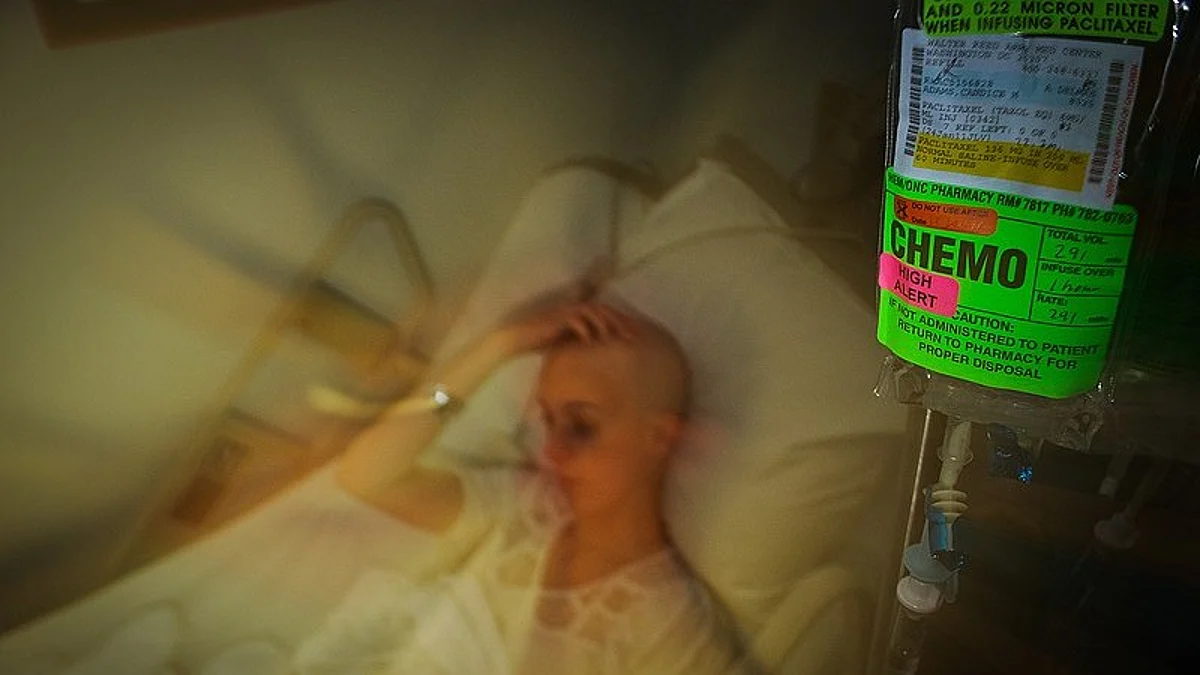 A patient undergoing Chemotherapy. [Wikimedia Commons.