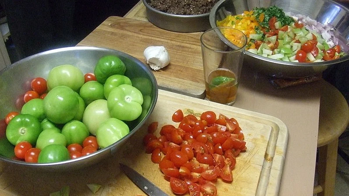 Cooking with diced vegetables. Wikimedia Commons
