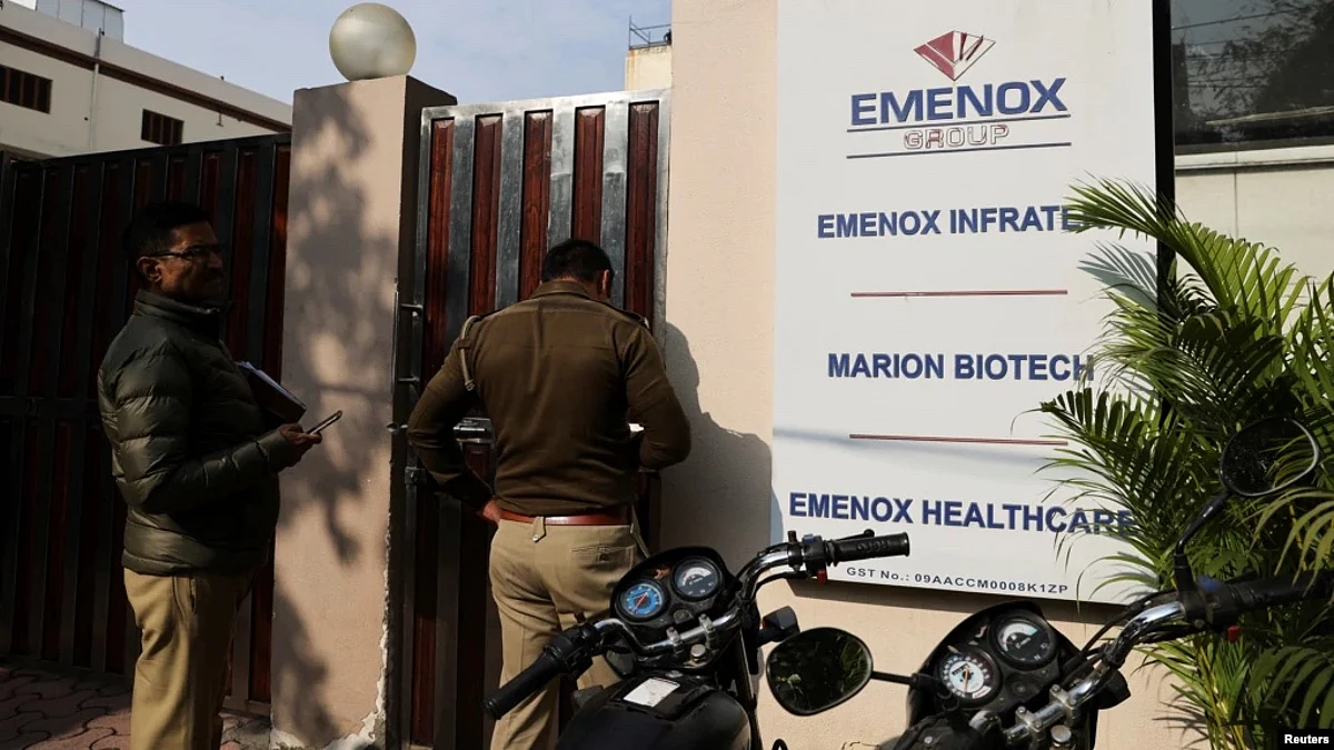 Police is seen at the gate of an office of Marion Biotech, a health care and pharmaceutical company and a part of the Emenox Group, whose cough syrup has been linked to the deaths of children in Uzbekistan, in Noida, India, Dec. 29, 2022