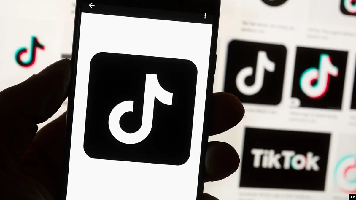FILE - The TikTok logo is seen on a cell phone in an illustration photo taken Oct. 14, 2022, in Boston, Massachusetts.