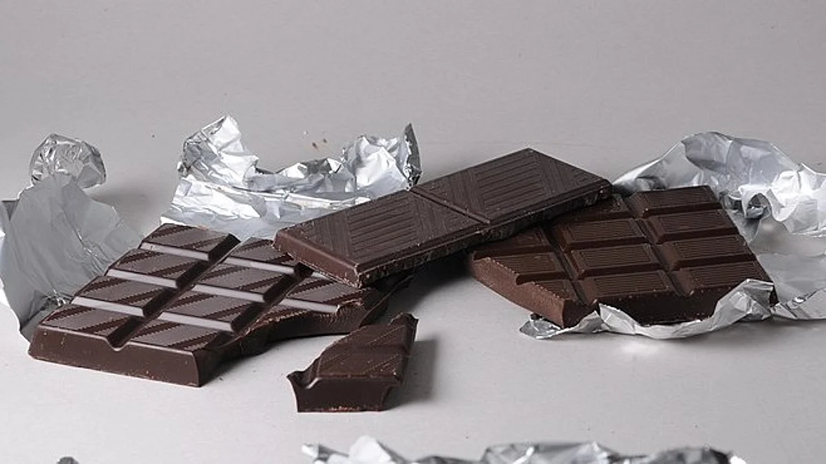 As chocolate changes from solid into a smooth emulsion that many people find totally irresistible Wikimedia Commons.