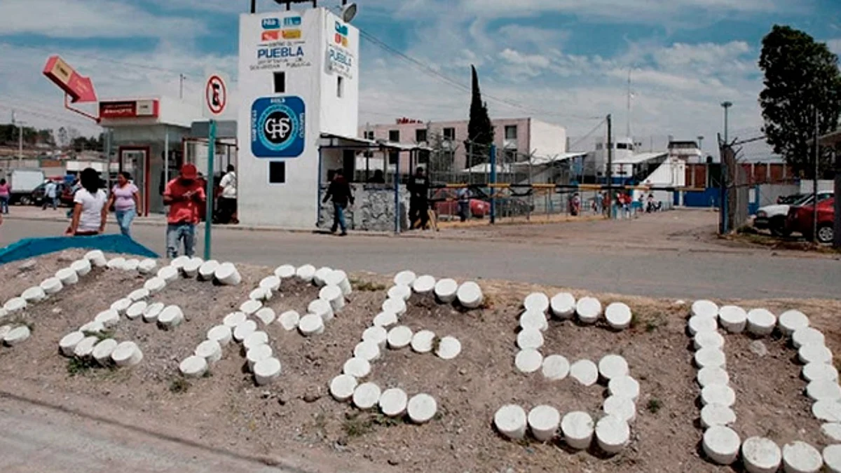 Identifican a quien depositó cuerpo de bebé en basurero de cereso en Puebla