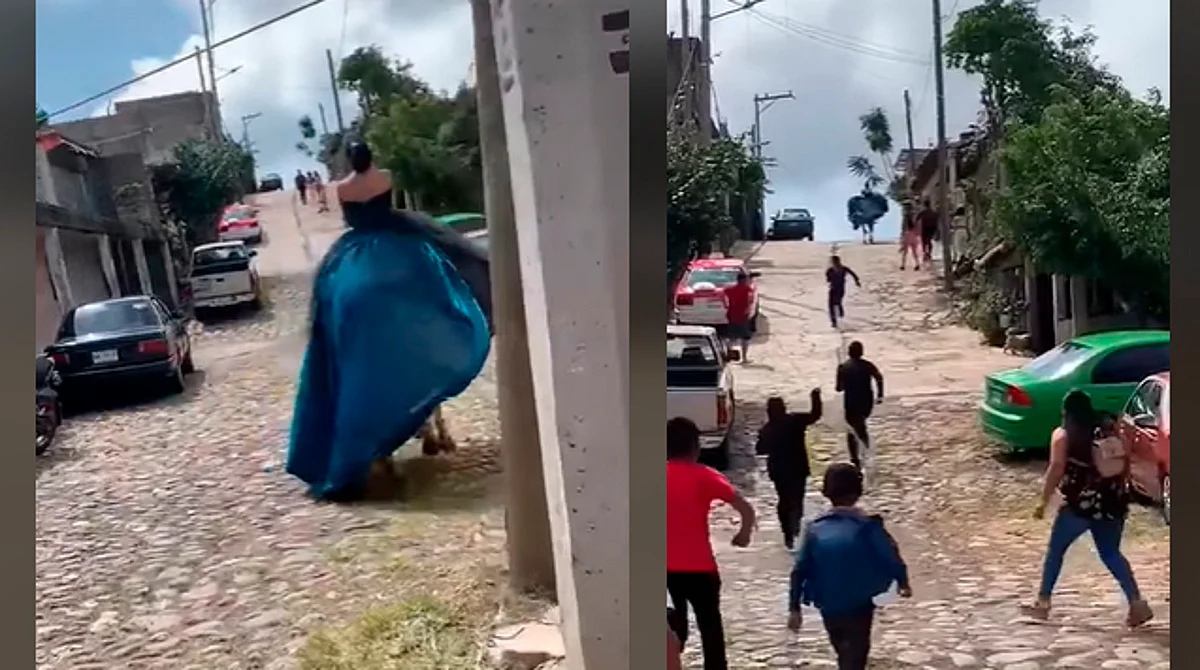 En el material se ve a una quinceañera de vestido azul que está montada en un caballo cuando éste de repente sale corriendo