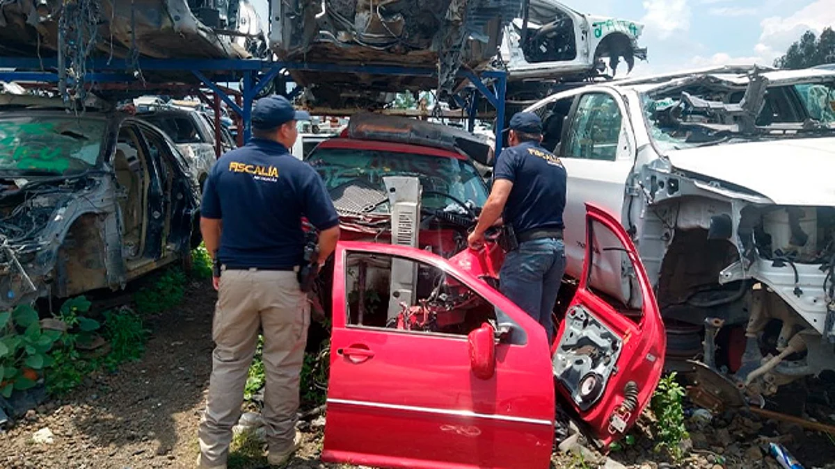 Catean deshuesadero y aseguran autos con reporte de robo, en Morelia