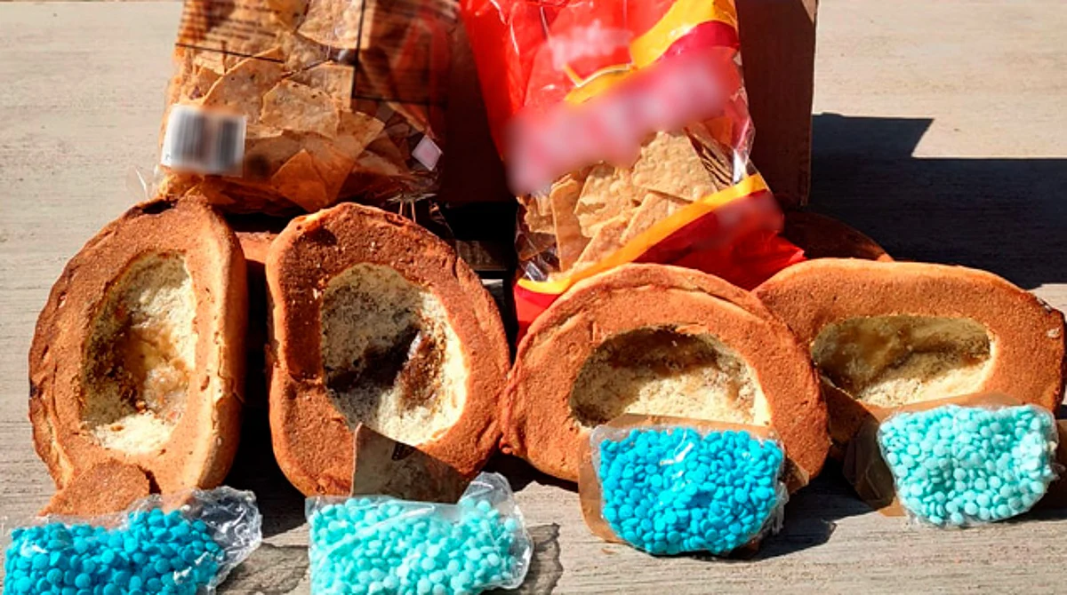 Hallan panes con droga escondida en empresa de mensajería de Culiacán