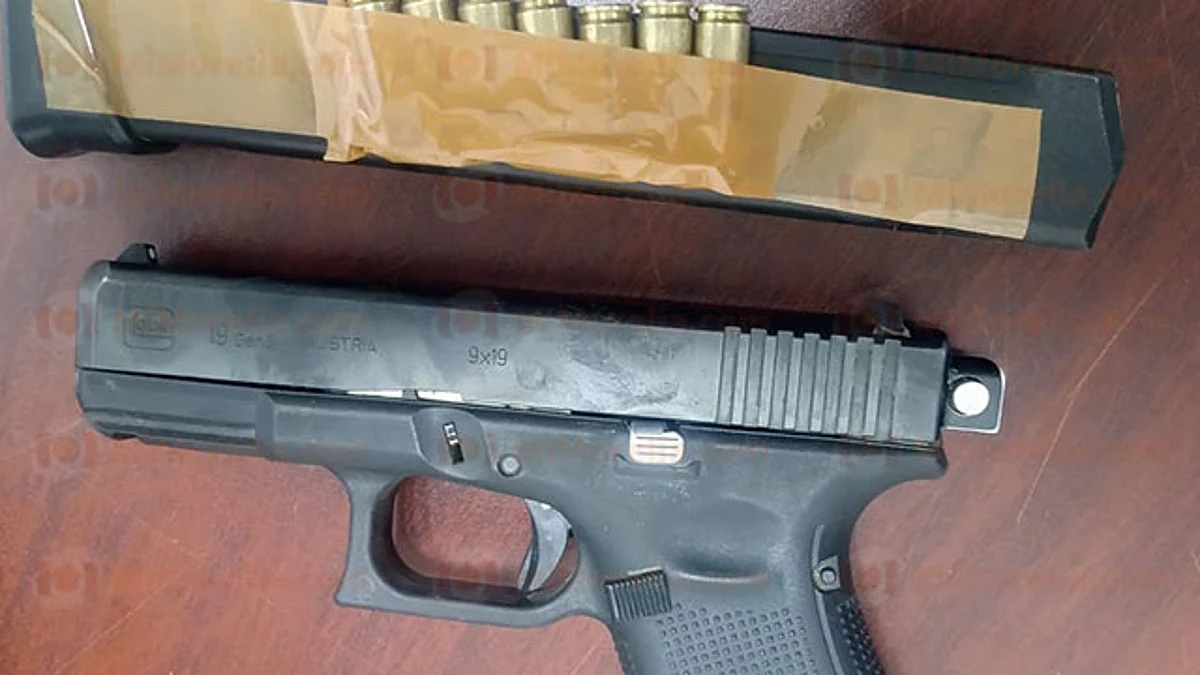Detienen a dos en posesión de un arma de fuego y cartuchos útiles, en Morelia