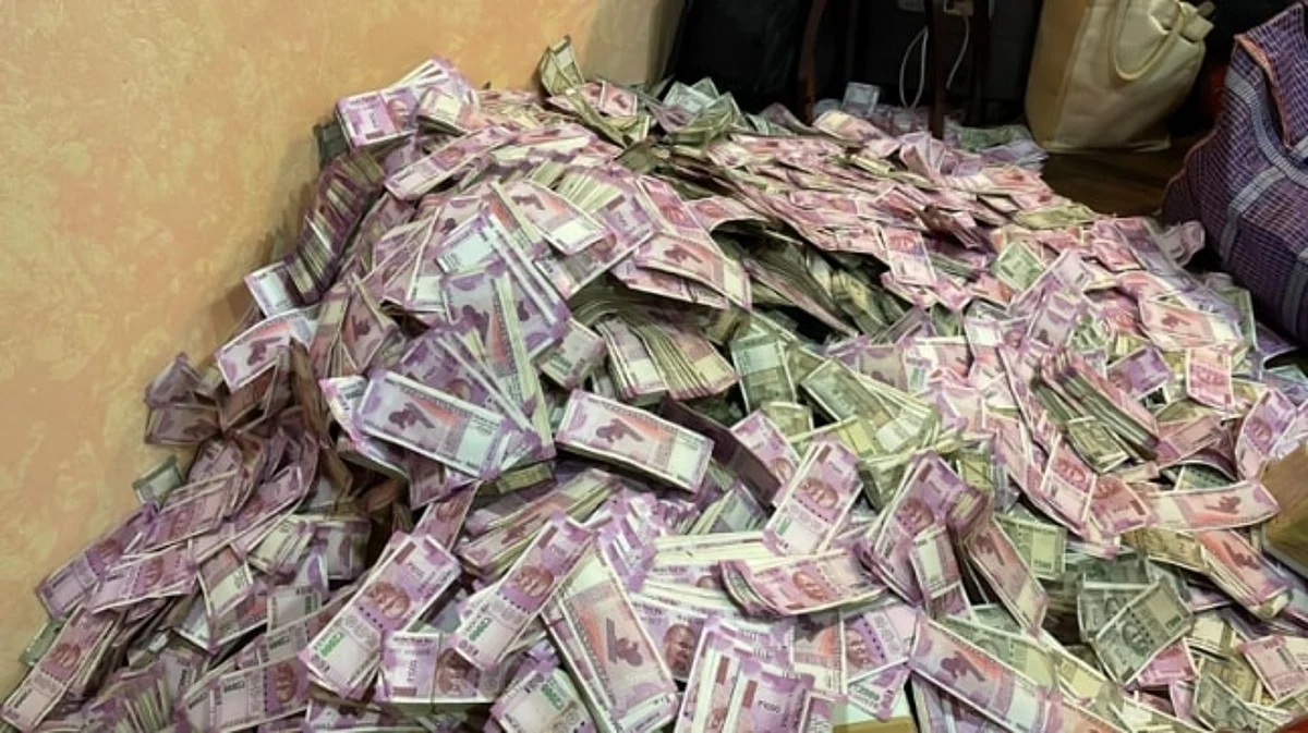 Rs 20 crore seized after ED raids on Bengal minister's aide