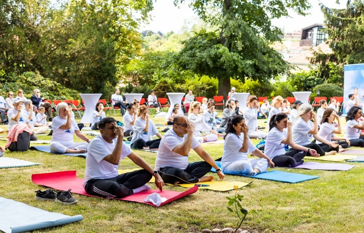 Yoga lovers perform asanas at the India House Garden in Prague, marking the 8th International Day of Yoga.