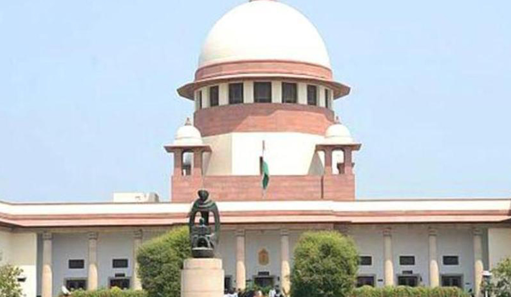 Abusing SC/ST person over phone in public place an offence: SC