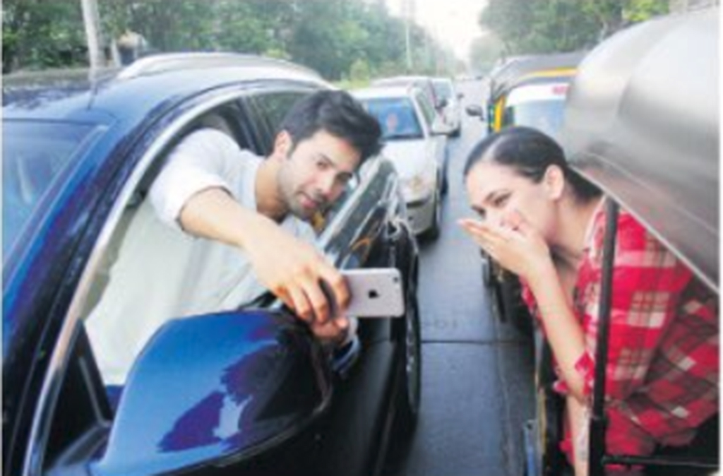 Varun Dhawan’s selfie stunt leads to challan, apologises