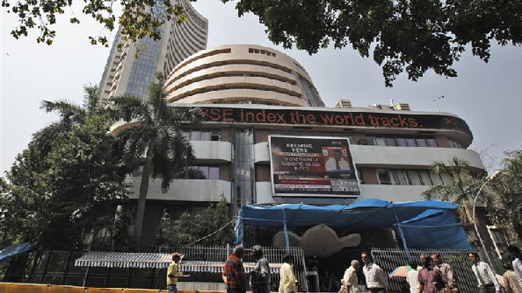 Weak global cues subdue equity indices, Sensex closes below 35k