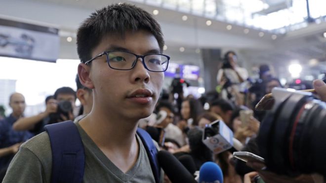 Hong Kong activist Joshua Wong walks free, calls on leader to resign