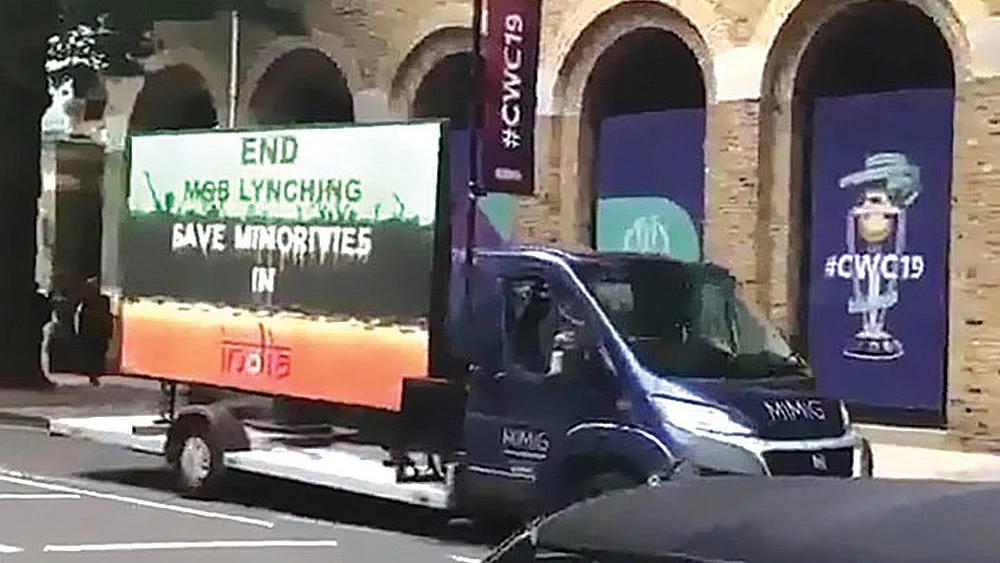 A van with a display board in London, outside the Lord’s cricket ground, calls upon Indians to put an end to the unending spate of mob lynchings