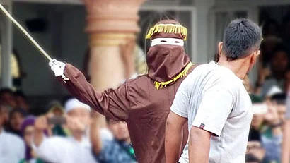 11 people whipped for extramarital relations in Indonesia