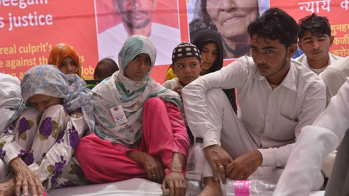 Pehlu Khan’s son Irshad (extreme right) and other family members staging a dharna at Jantar Mantar in New Delhi demanding justice for the slain dairy farmer (PTI file photo).