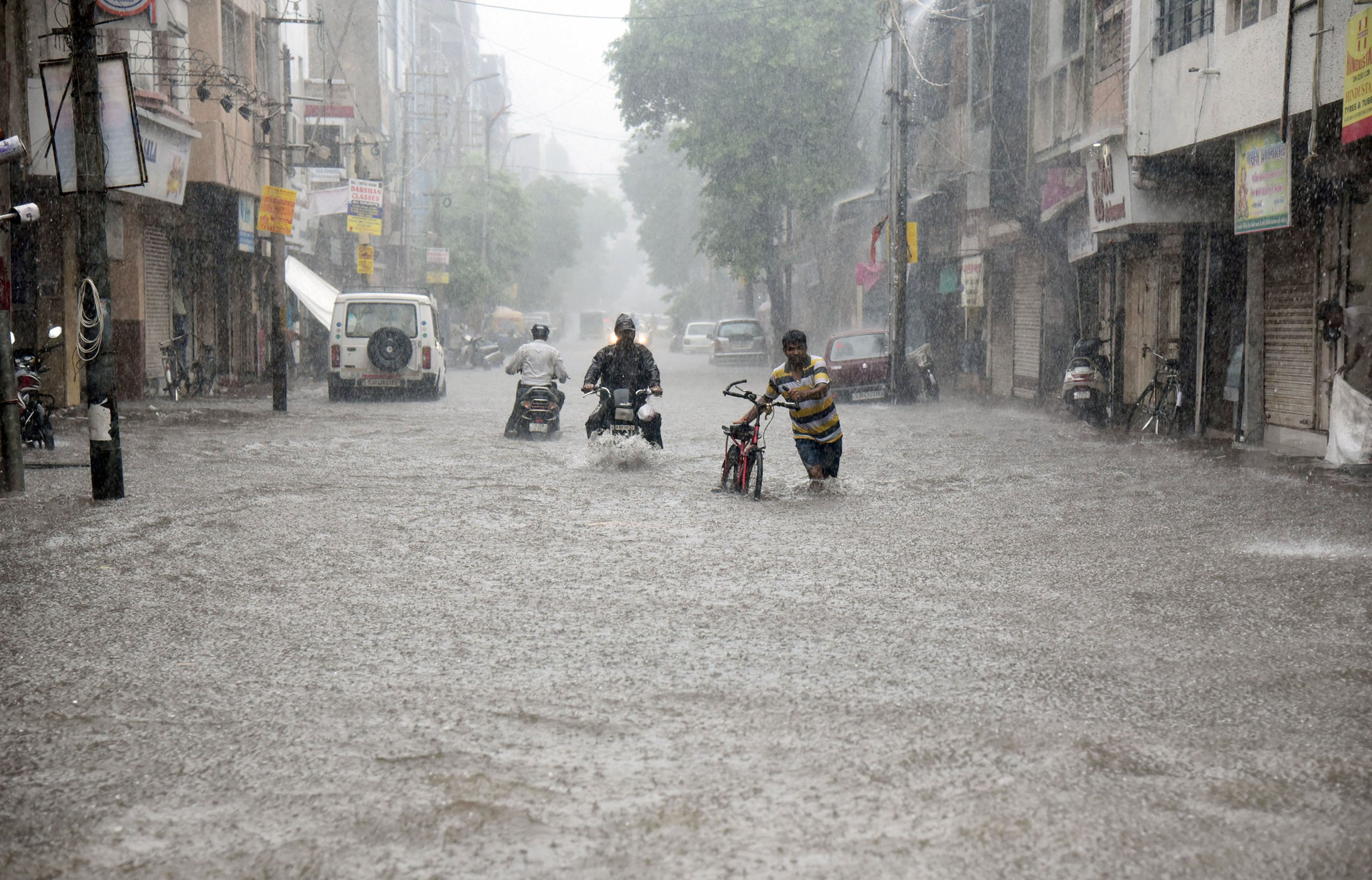 Heavy rains pound Mumbai; normal life, rail traffic comes to a standstill