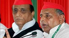 Samajwadi Party patriarch Mulayam Singh Yadav with his colleague Azam Khan (file photo, PTI). 